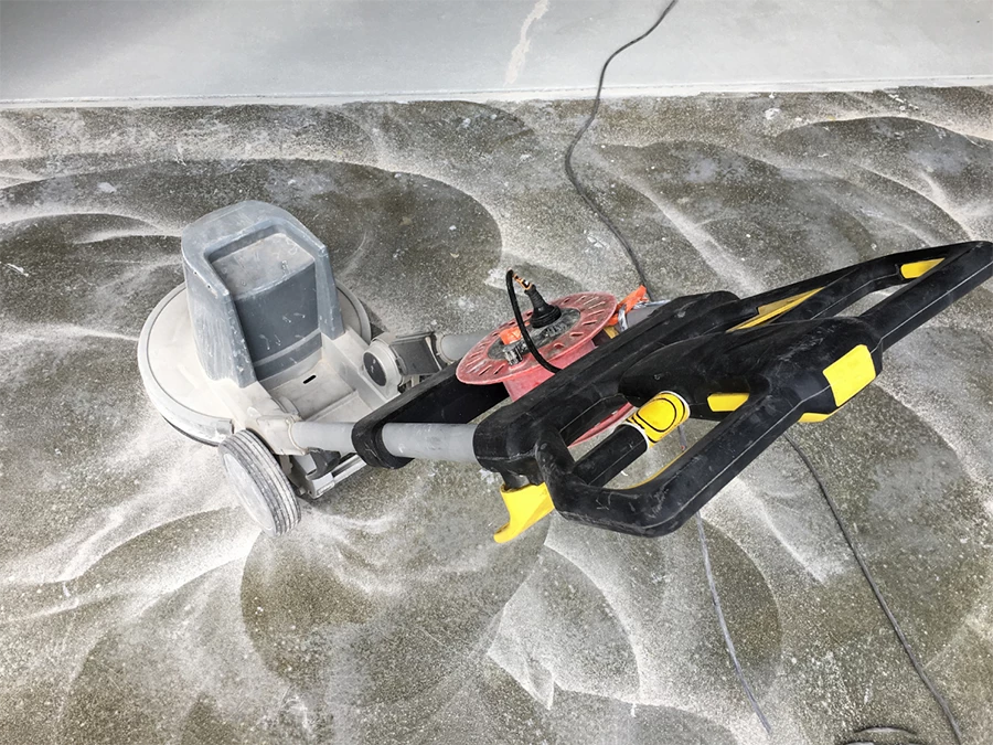 Professional cement polishing machine in action, showcasing cement polishing contractors in Gulf Coast