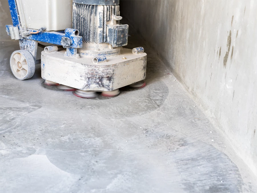 Professional concrete polisher machine working on a floor, showcasing concrete and cement polishing in Gulf Coast