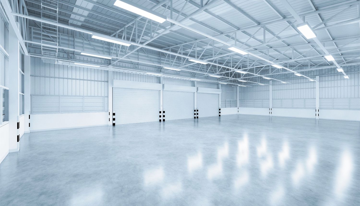 Polished concrete services in Houston applying a glossy finish to a floor in a stylish office setting.