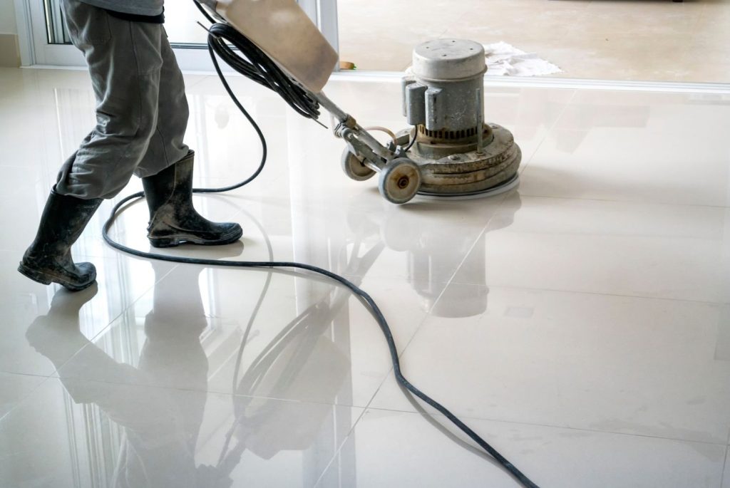High-gloss finish achieved on a commercial floor by an expert cement polishing company Houston.