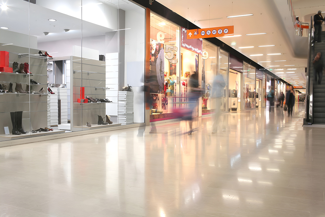 Polished cement services San Antonio for retail malls, showcasing glossy concrete floors that enhance aesthetics, durability, and customer traffic flow.