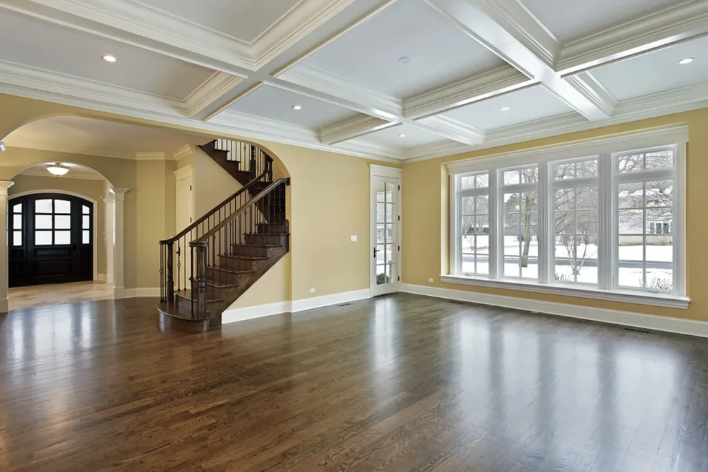 This large empty luxury home with wood floors is a potential project for a premier Polished cement company houston.