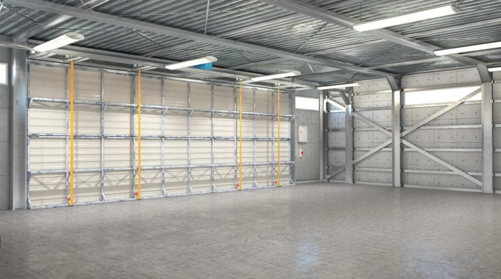 Professional industrial garage bay area with durable refinished concrete flooring Houston and metal wall structures.