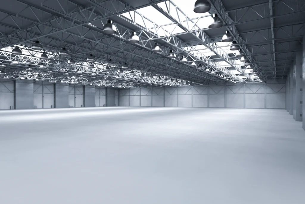 Modern, bright industrial space showcasing the flawless, high-gloss finished cement flooring houston look.