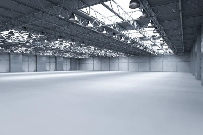 Modern, bright industrial space showcasing the flawless, high-gloss finished cement flooring houston look.