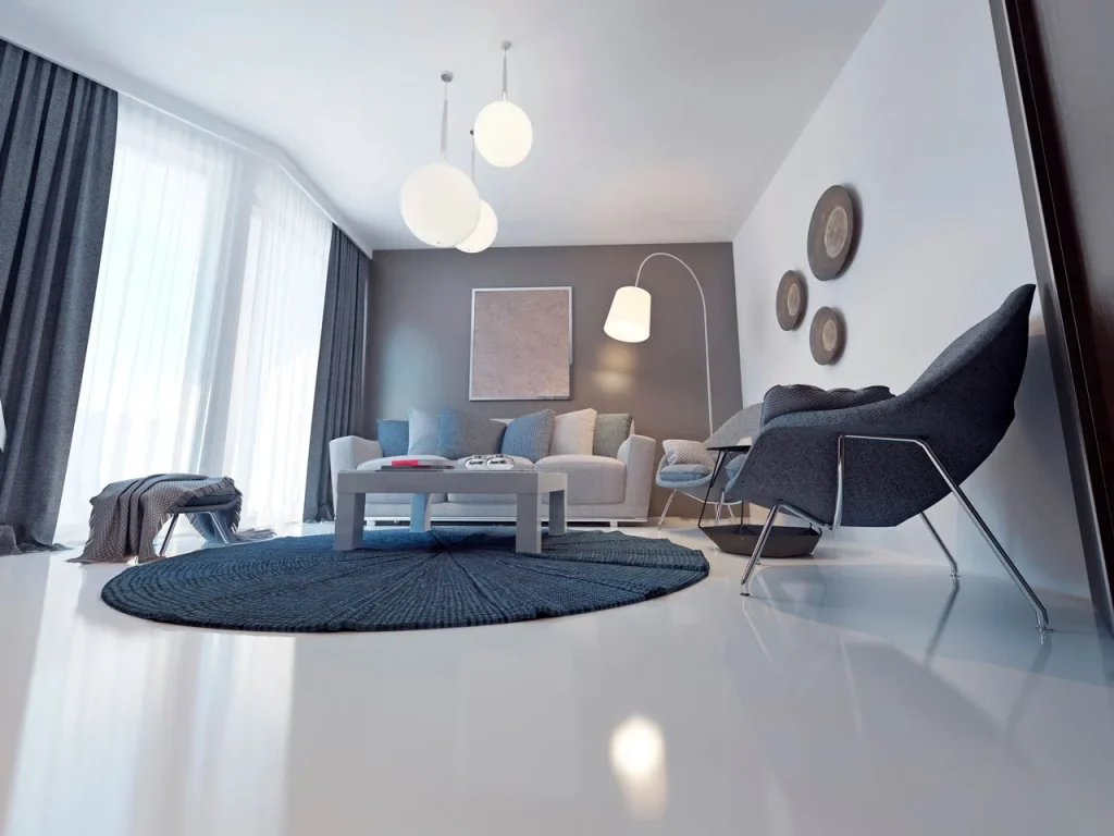 Polished concrete company Houston installs high gloss reflective flooring in a modern white living room.
