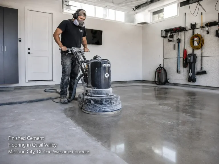 Contractor operating an HTC 650 polisher on a polished finished cement flooring houston residential garage.